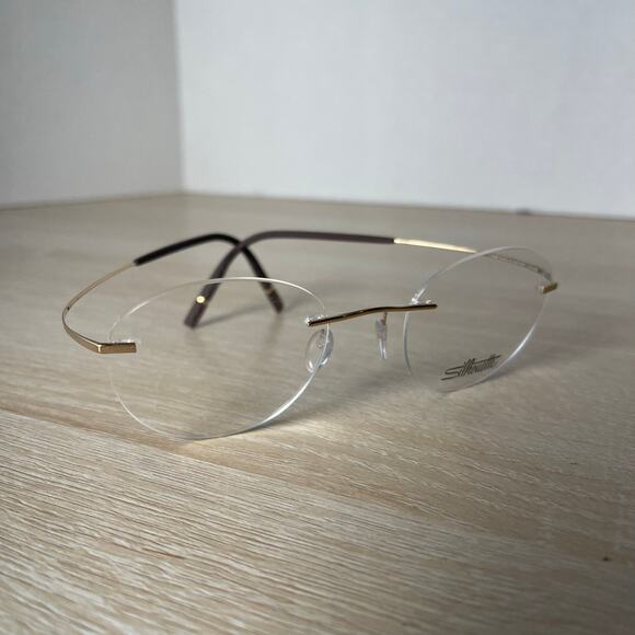 Silhouette Eyeglasses Brown Gold Rimless Round READ New With Imperfection 48-20 - Picture 1 of 8
